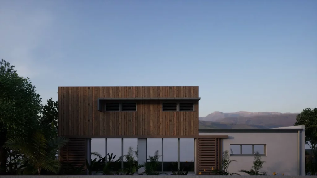 Façade bois avec persiennes et protections solaires à La Réunion, dans l’esprit de la RTAA DOM